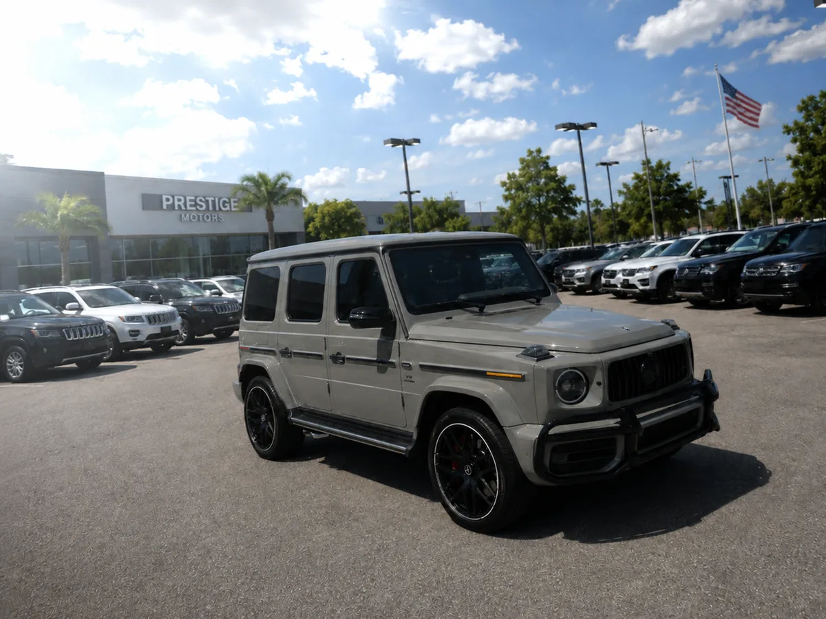 Vehicle photographed on the dealership lot before processing